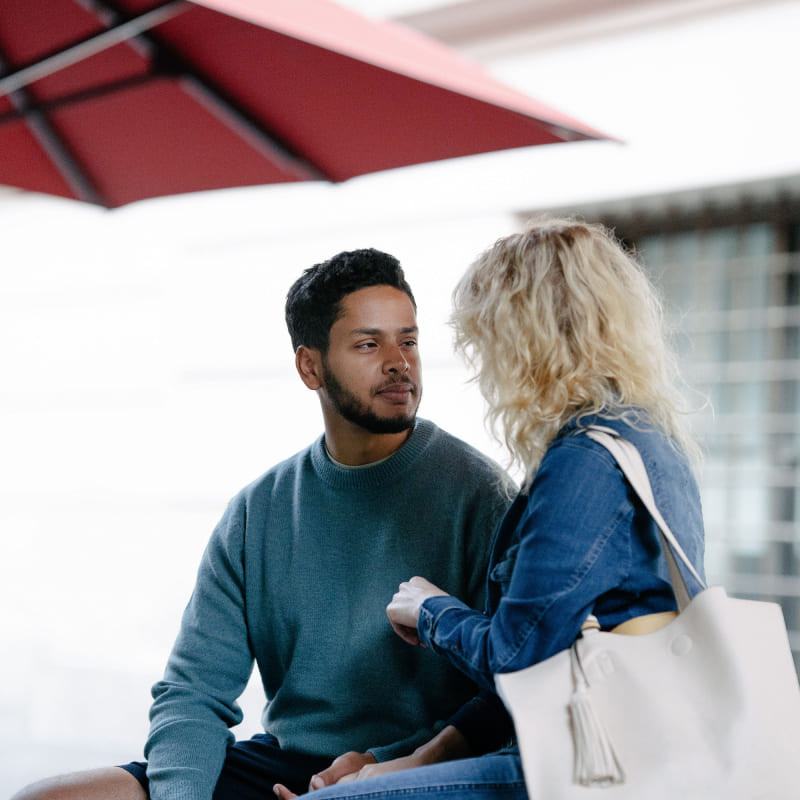 Couple connecting in conversation — Wellbe article on emotional intimacy